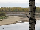У реки