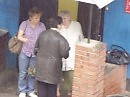 спрятались в беседе от дождя